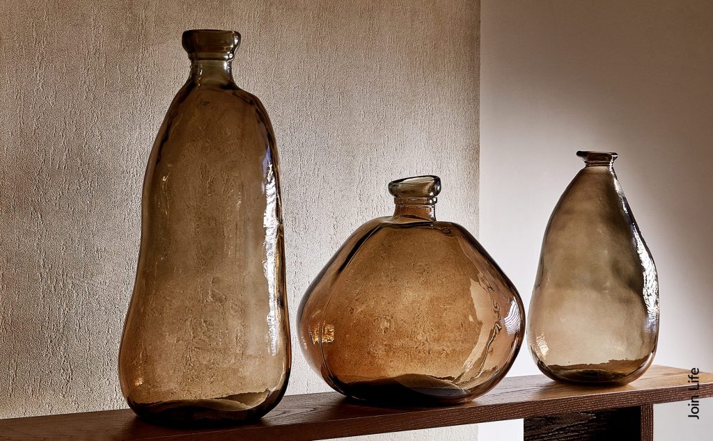 Mediterranean decor: Grey raw-shaped 100% recycled glass bottle Zara Home.